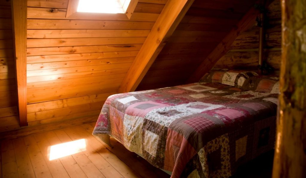 cabin with made bed