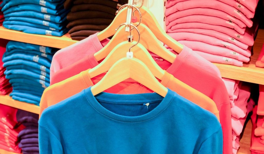 t-shirts on the rack that is stored in a storage facility